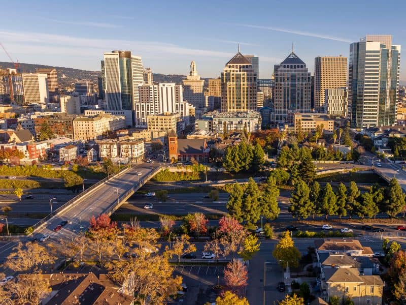 Downtown Oakland skyline with city buildings, roads, and urban landscape for Oakland land surveying services